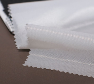 How Does a Highly Cost-Effective Recycled Polyester Interlining Manufacturer Reduce Environmental Impact
